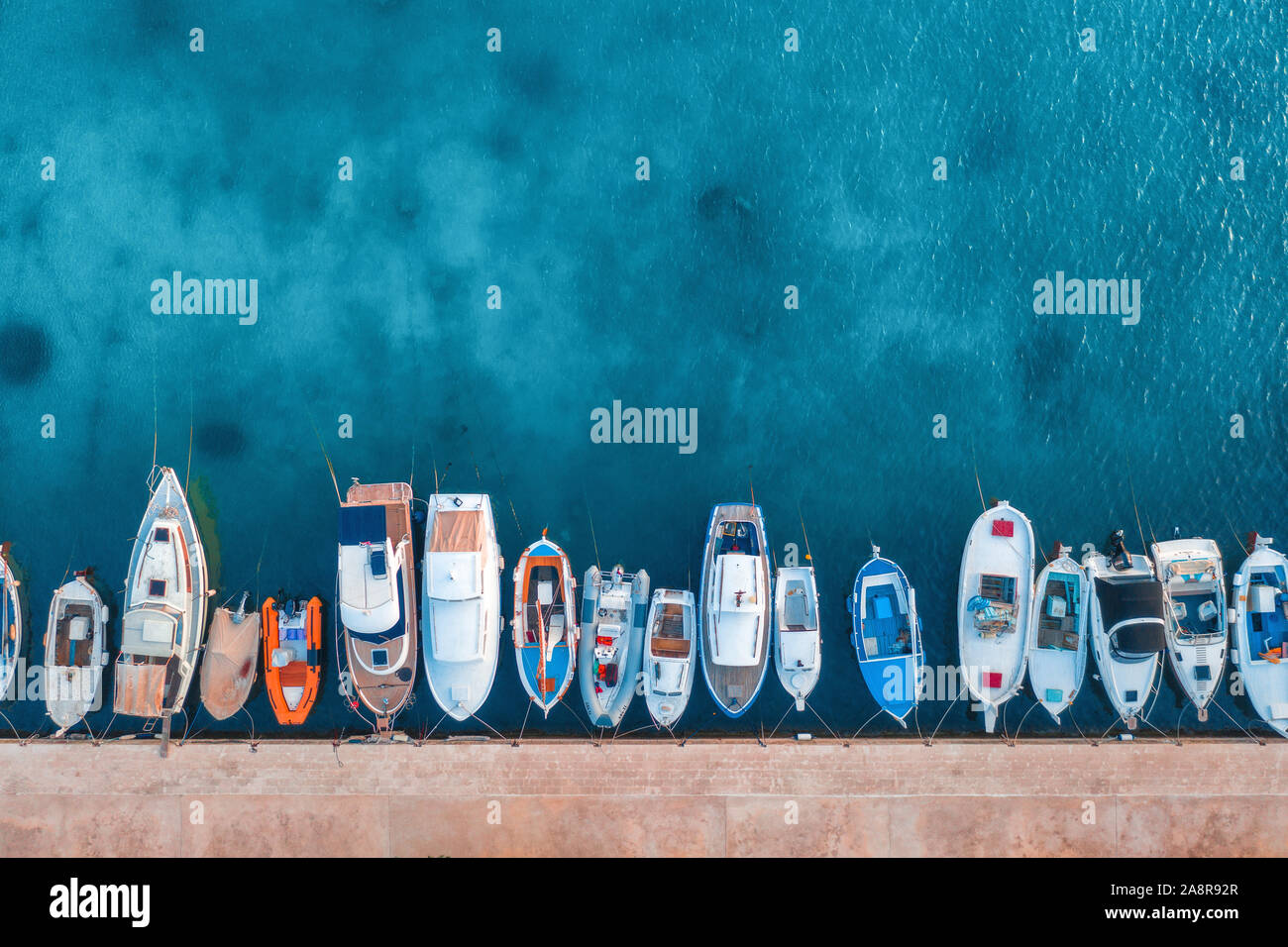 Aerial view of the fishing boats and yachts on tropical sea coast Stock ...