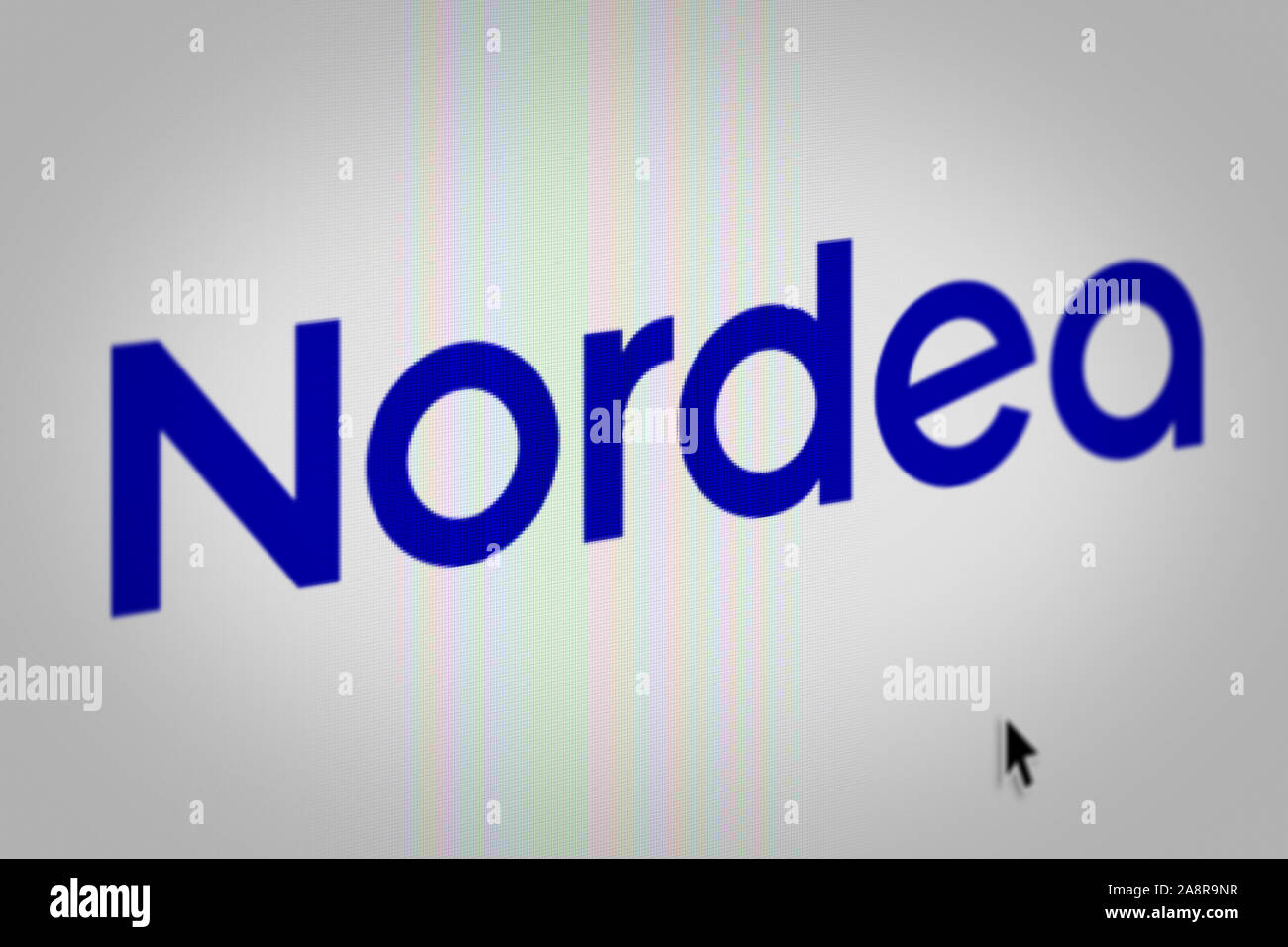 Logo of the public company Nordea Bank displayed on a computer screen in close-up. Credit: PIXDUCE Stock Photo