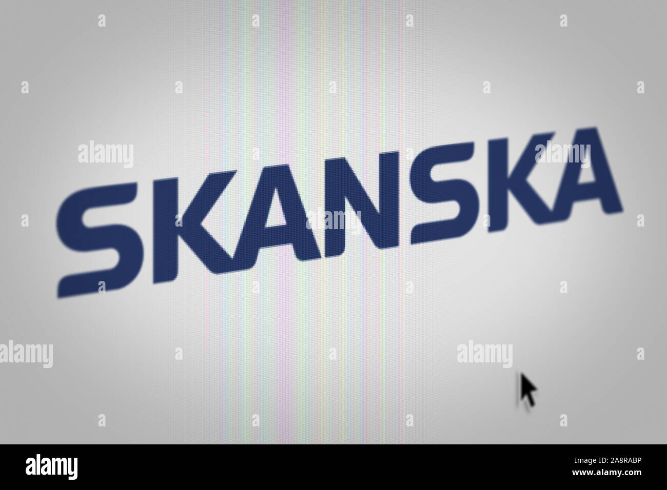 Logo of the public company Skanska displayed on a computer screen in close-up. Credit: PIXDUCE Stock Photo