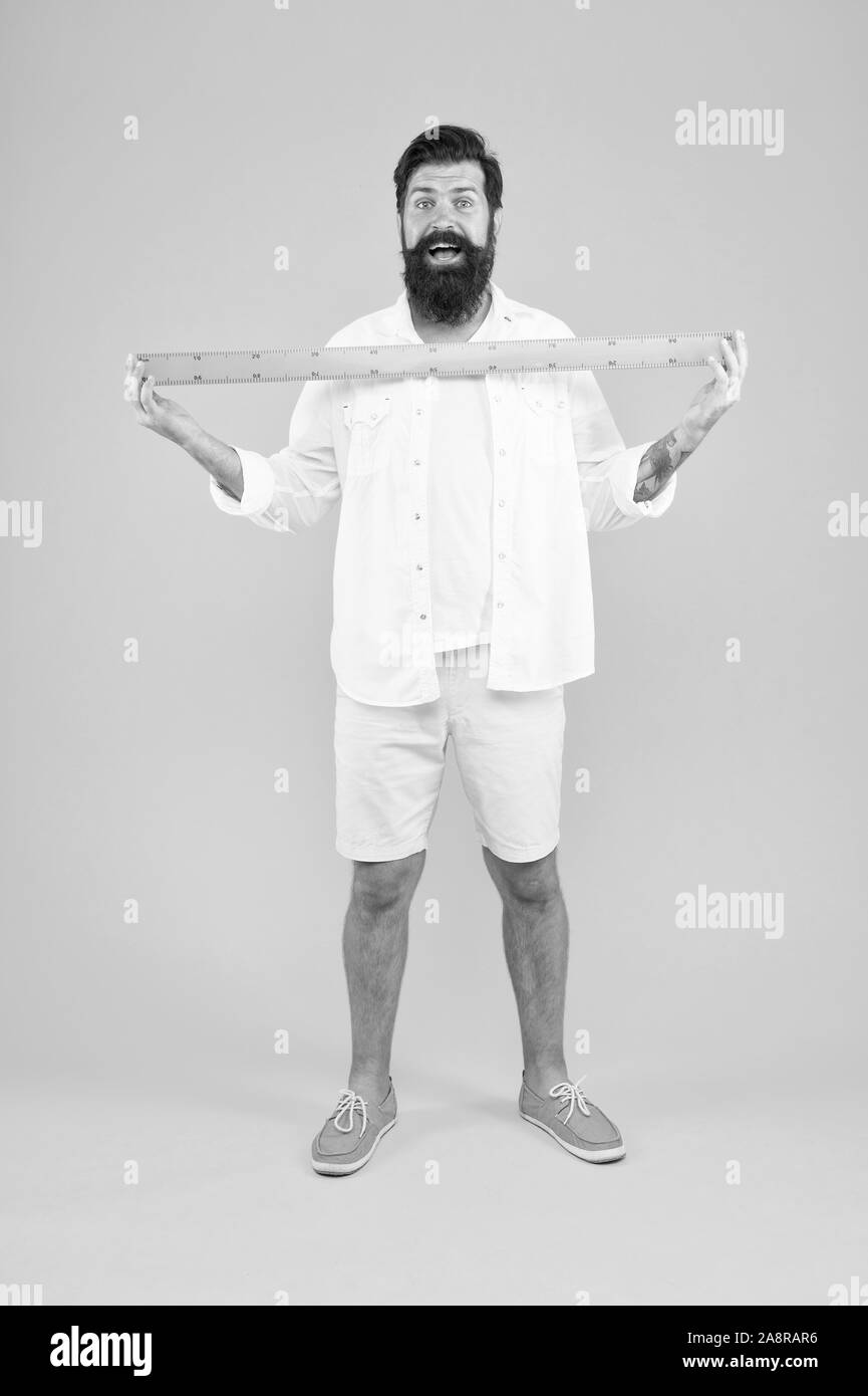 Mesuring his beard. Maths teacher or student taking measurements of ...