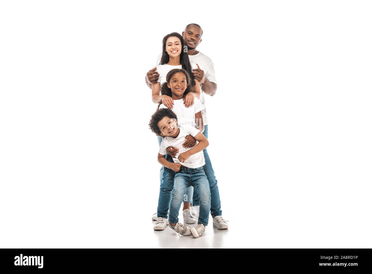 Cheerful African American Family Standing One Behind Other And Smiling