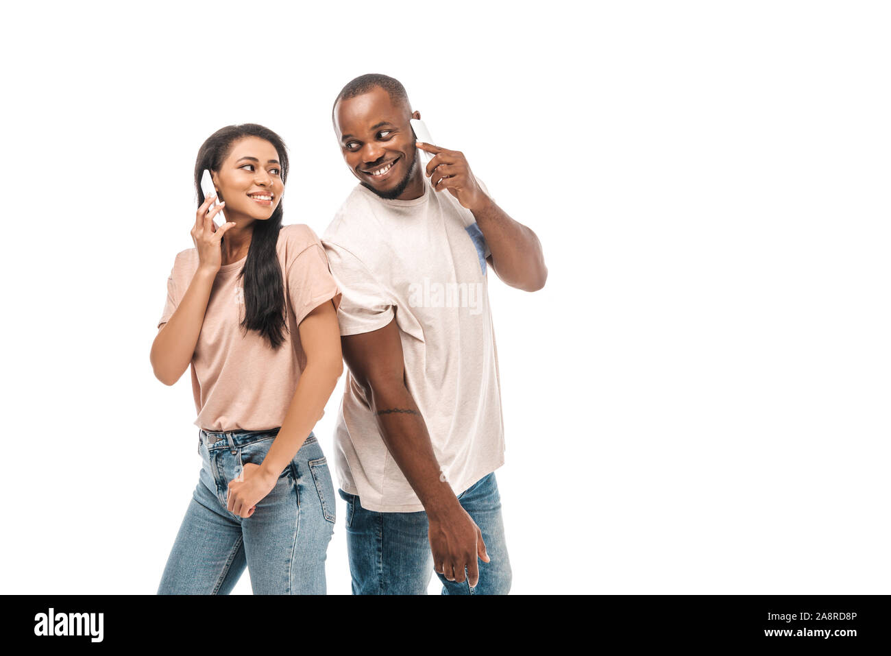 happy african american couple looking at each other while talking on ...