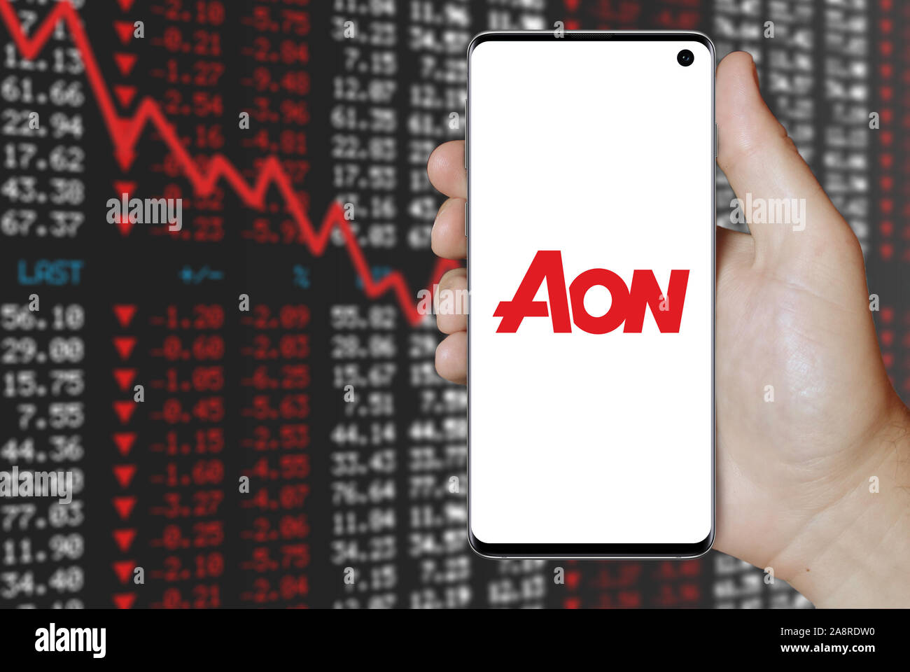 Logo of public company Aon plc displayed on a smartphone. Negative ...