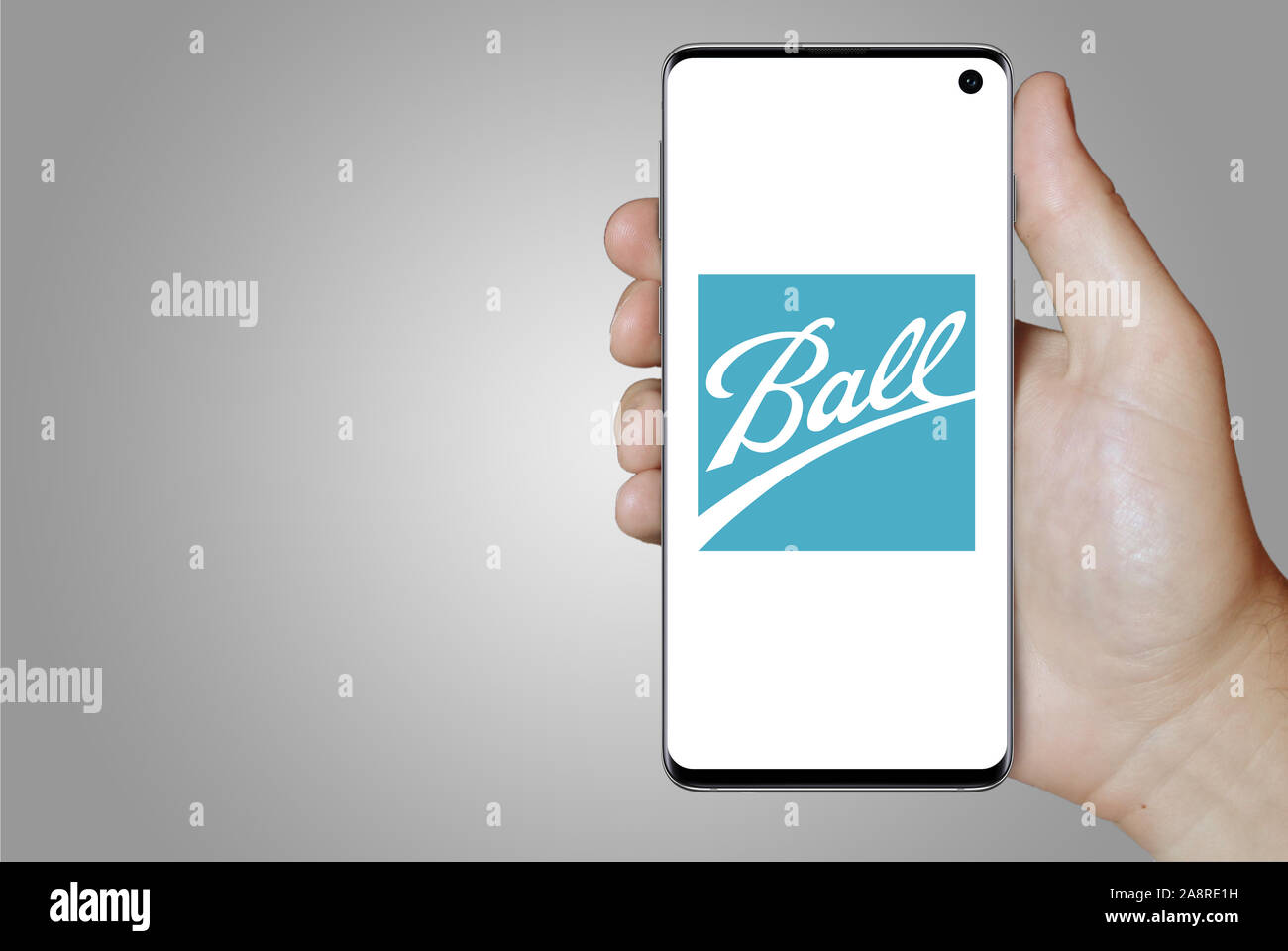 Logo of public company Ball Corp displayed on a smartphone. Grey