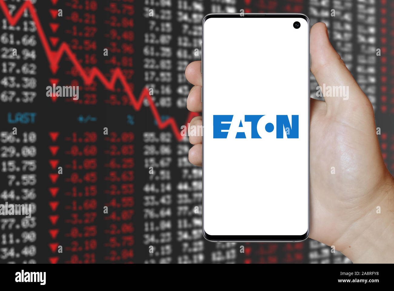 Logo of public company Eaton Corporation displayed on a smartphone. Negative stock market background. Credit: PIXDUCE Stock Photo