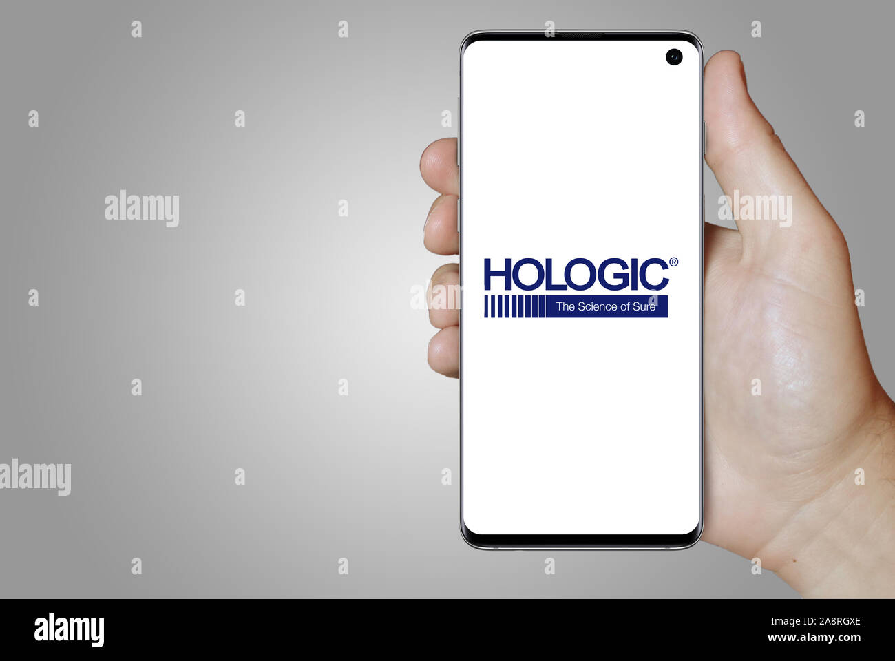 Logo of public company Hologic displayed on a smartphone. Grey