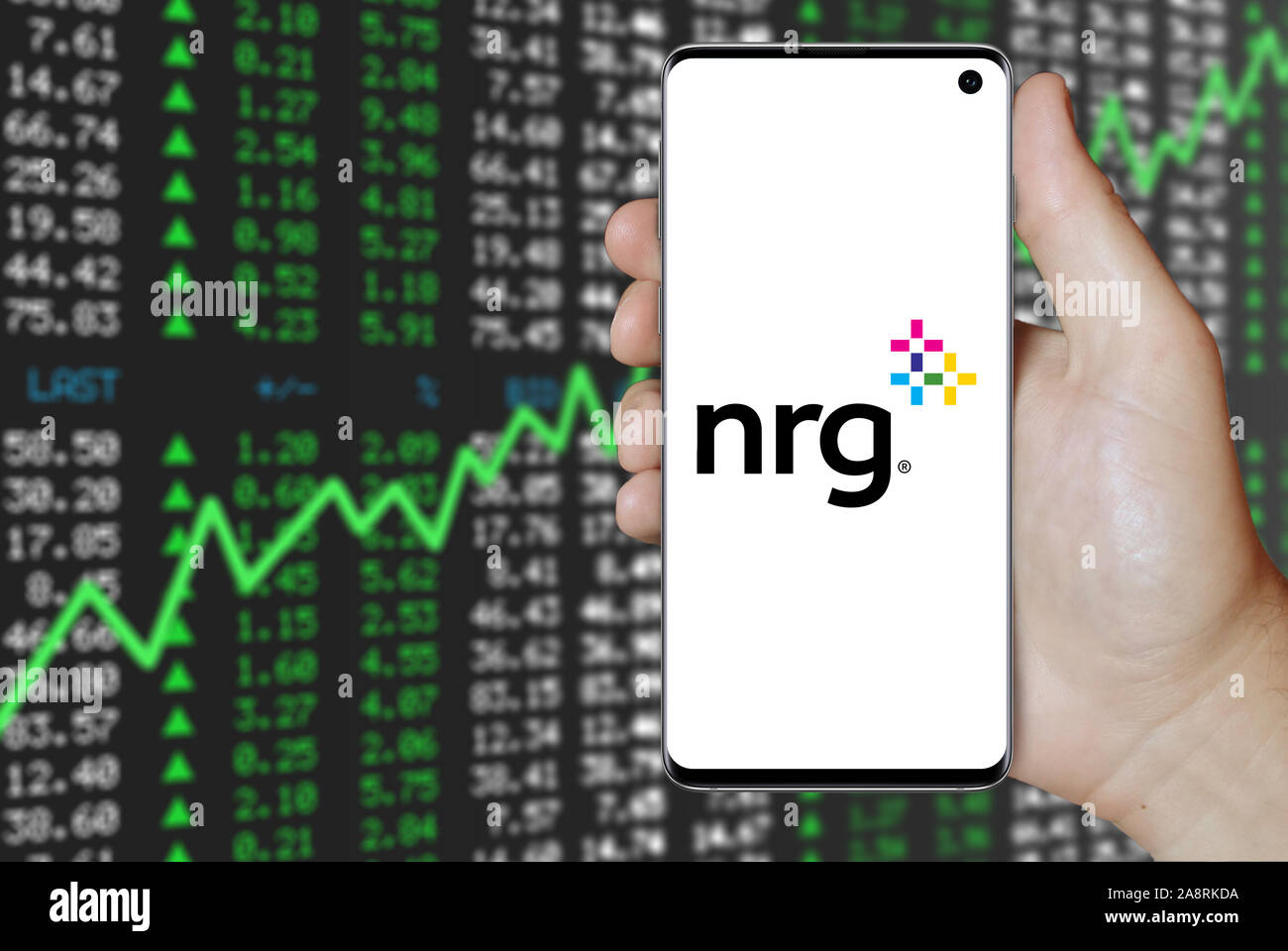 Logo of public company NRG Energy displayed on a smartphone. Positive
