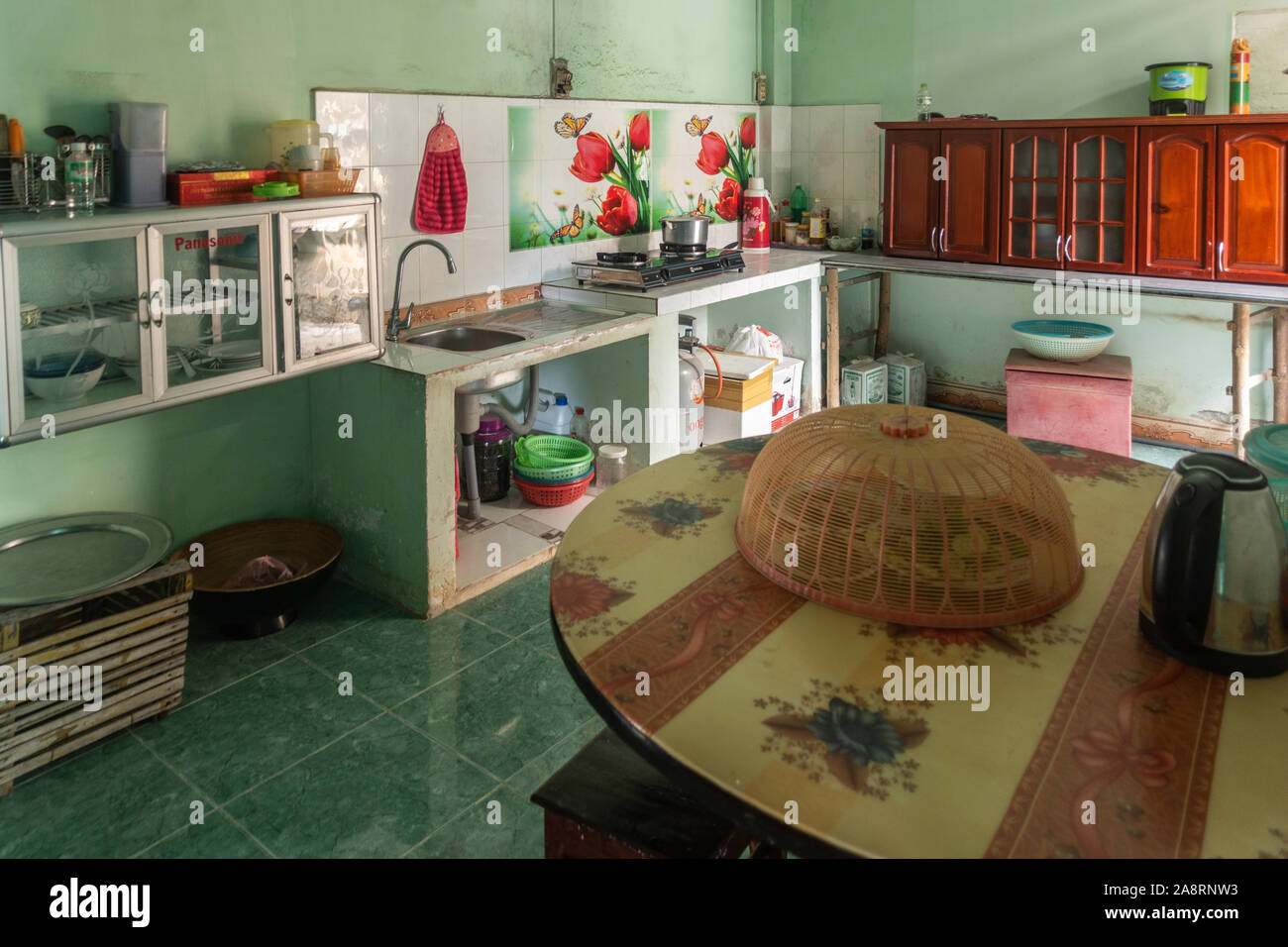 Nha Trang, Vietnam March 11, 2019 Inside Farm house. Kitchen with sink, stove, reddish