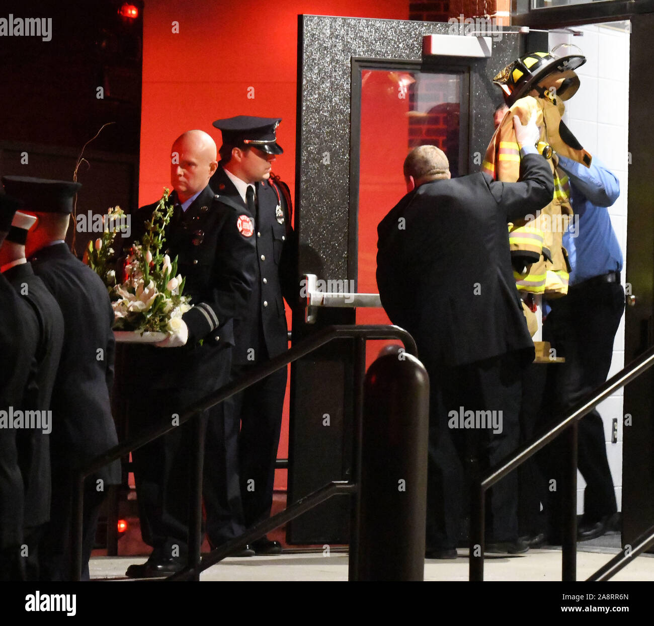 Union Grove, Wisconsin, USA. 10th Nov, 2019. Firefighter Serdynski's turnout gear is carried out after a visitation and a memorial service were held at Union Grove Union High School Sunday November 10, 2019 for Brian Serdynski of the Union Grove - Yorkville (Wisconsin) Fire Department who died November 2. Serdynski, 38, had suffered a heart attack on an emergency call two weeks earlier, but had been cleared to return to duty. He died at home. He is survived by his wife and three young children. Wisconsin Gov. Tony Evers ordered flags to be flown at half staff until his funeral. (Credit Im Stock Photo