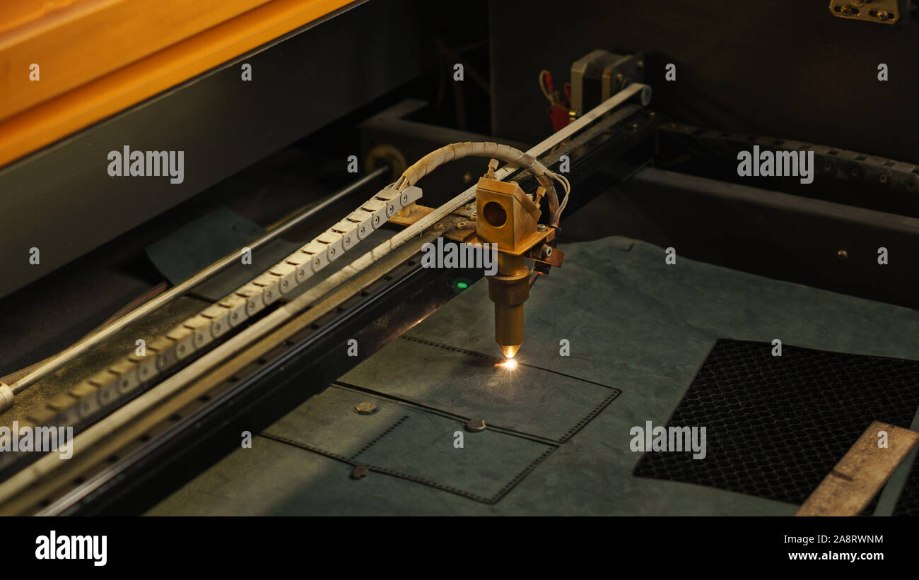 Laser cutting beam artificial leather High precision. Modern machine