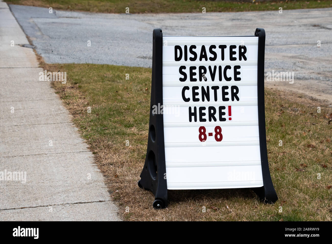 A disaster service center sign in Speculator, NY USA following severe flooding from a major rain storm on Halloween. Stock Photo