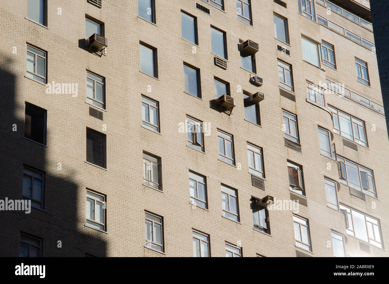 Windows on a building facade in Manhattan, New York City Stock Photo