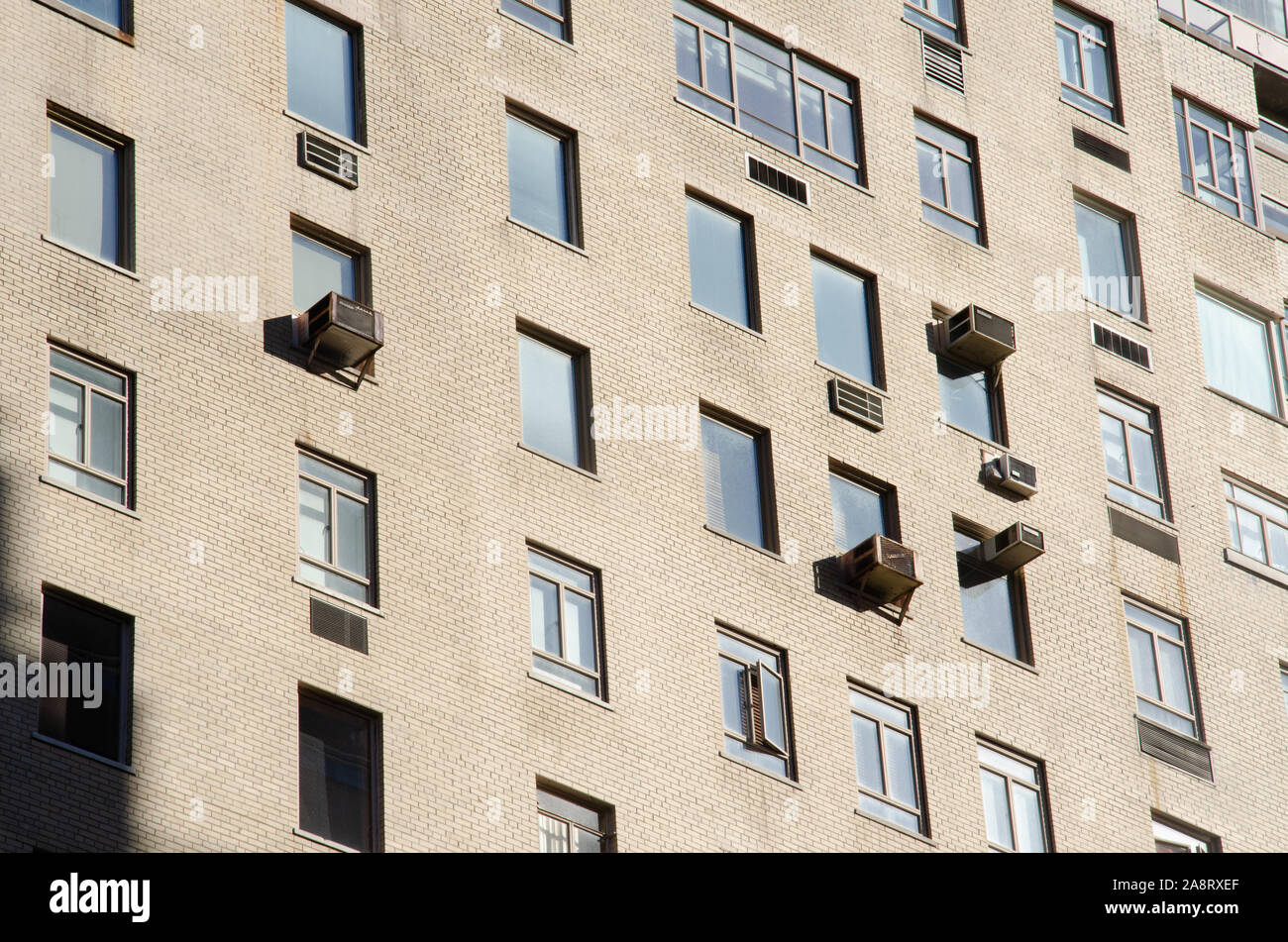 Windows on a building facade in Manhattan, New York City Stock Photo