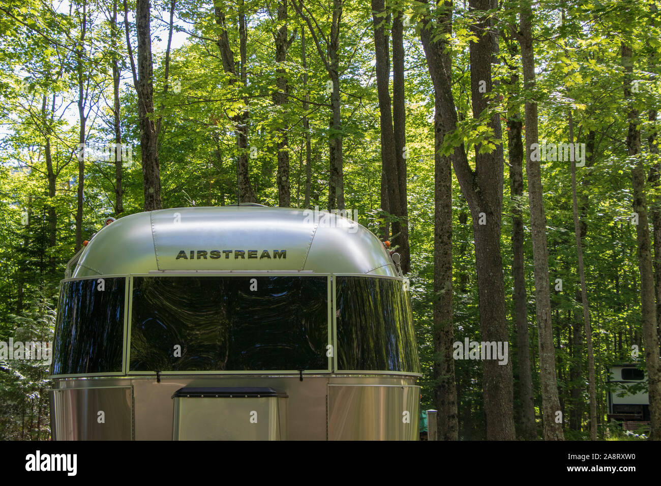 Front view of Airstream Trailer on a campsite, RV sites, Camping du Lac Lyster : September 1, 2019 - Coaticook, Québec, Canada; caravanning Stock Photo