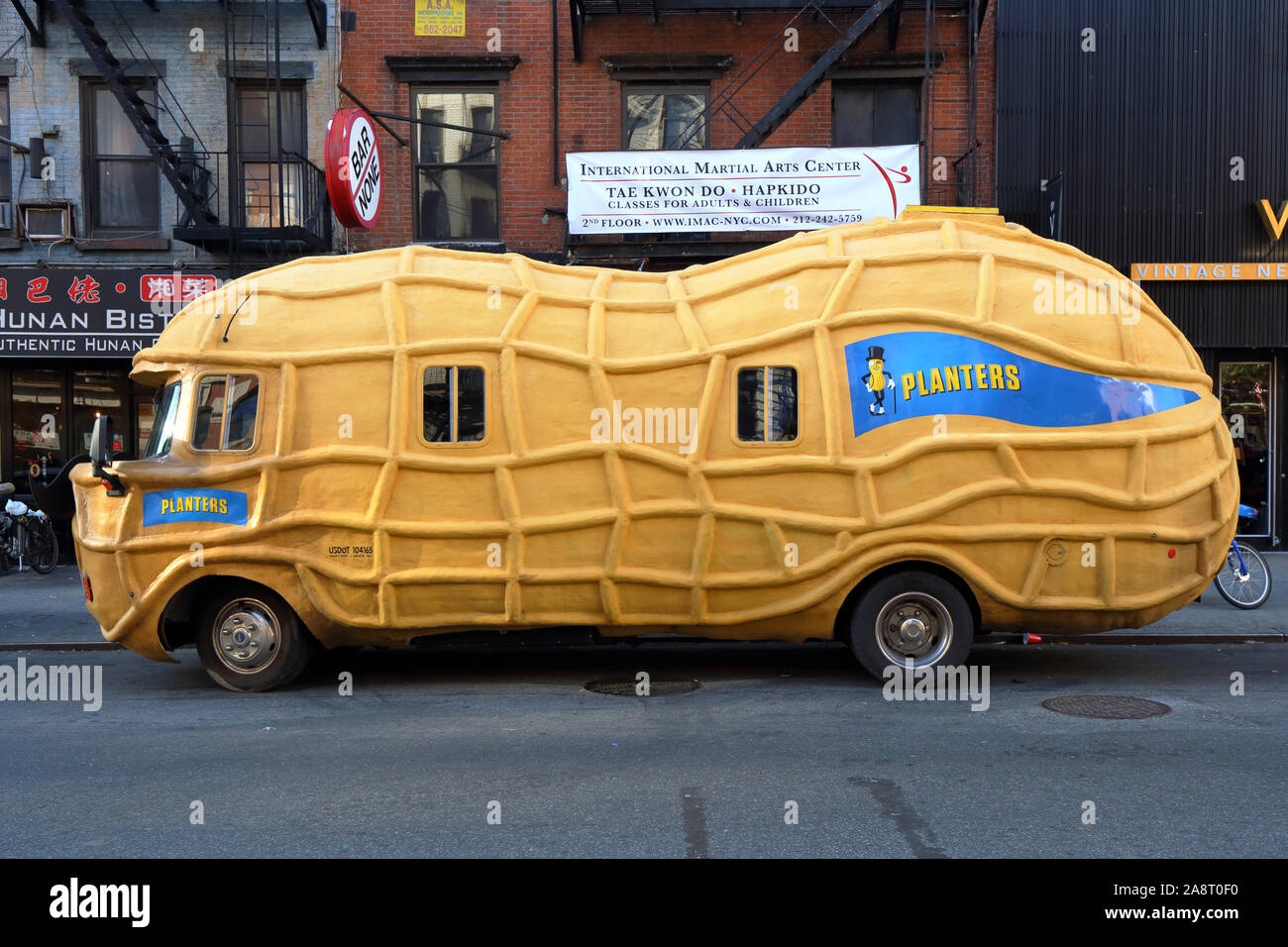 A Planters Nutmobile parked on a street in New York City Stock Photo
