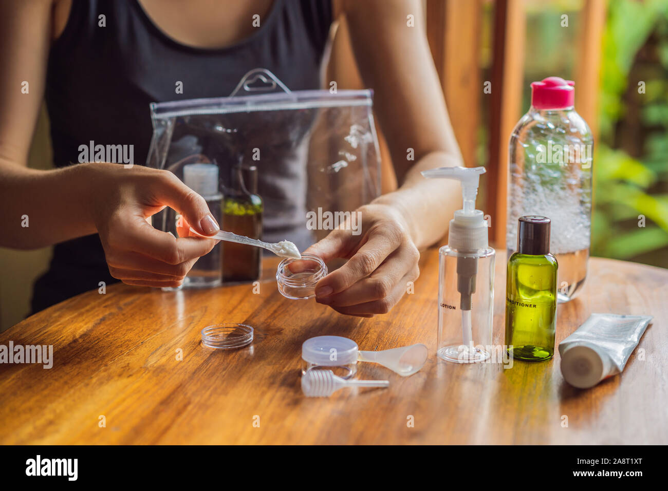 Travel kit for transporting cosmetics on an airplane. Cosmetics are