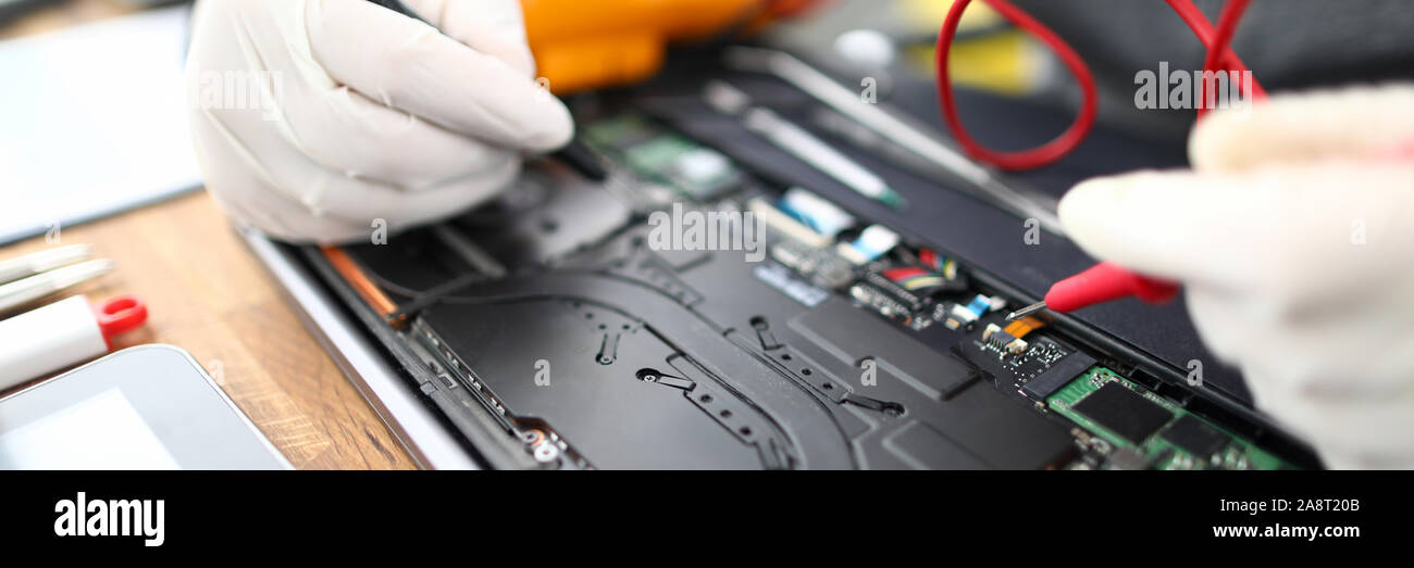 Male hands in white protective glove hold Stock Photo