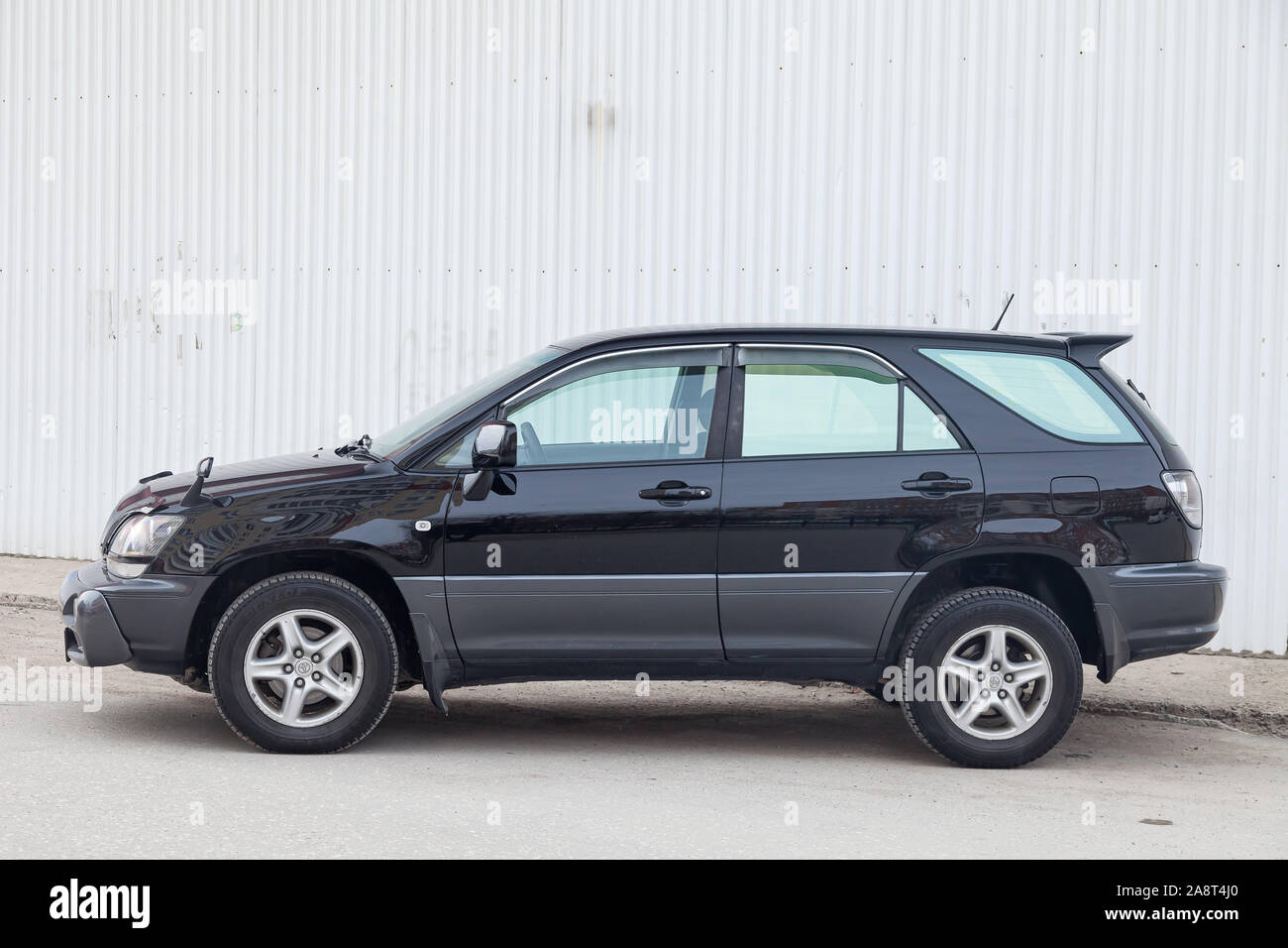 Novosibirsk, Russia - 11.05.2019: Black Toyota Harrier or Lexus RX300 1997 year side view with gray interior in excellent condition in a parking space Stock Photo
