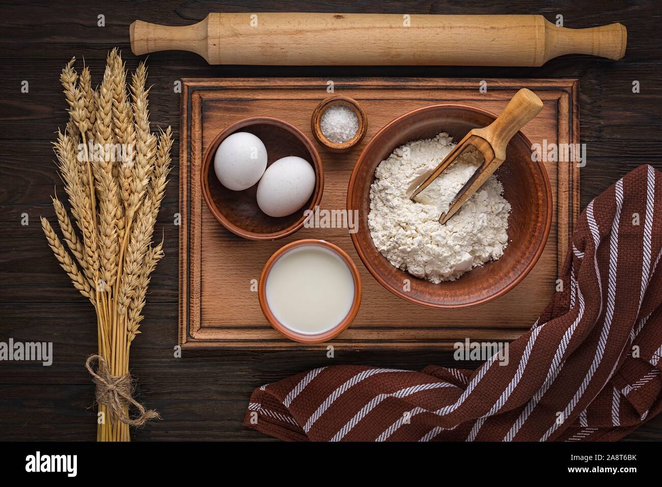 egg butter, baking ingredients, copy space, wooden background, milk butter sugar, milk butter sugar Stock Photo