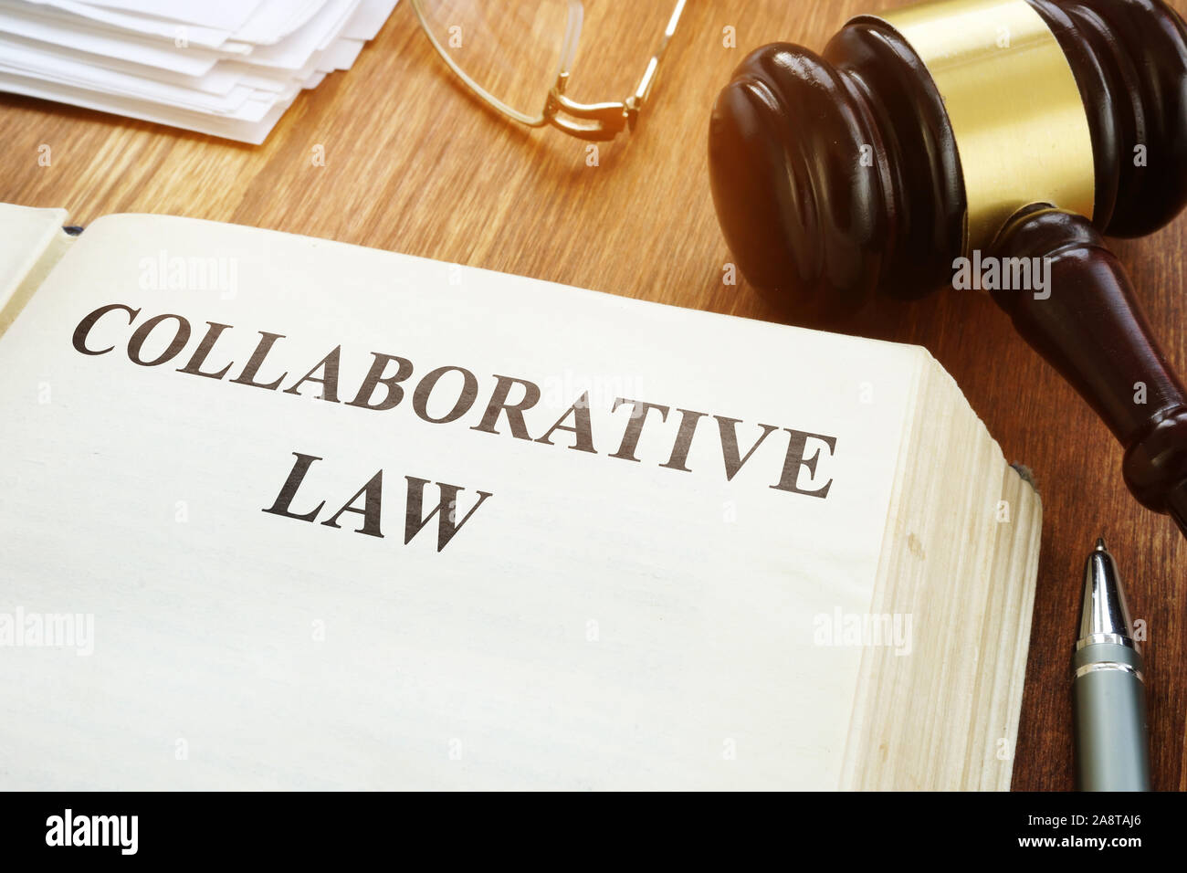 Collaborative law book, gavel and papers. Stock Photo
