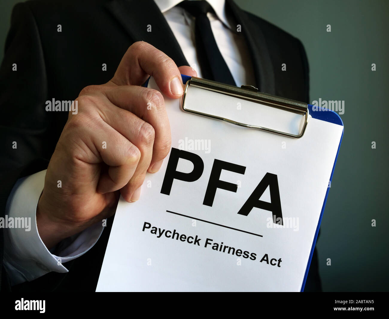 Boss is holding Paycheck Fairness Act PFA. Stock Photo