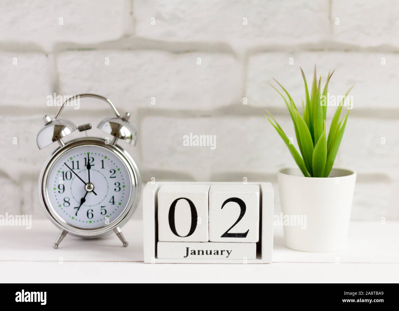 January 2 on the wooden calendar, the beginning of a new day and year Stock Photo