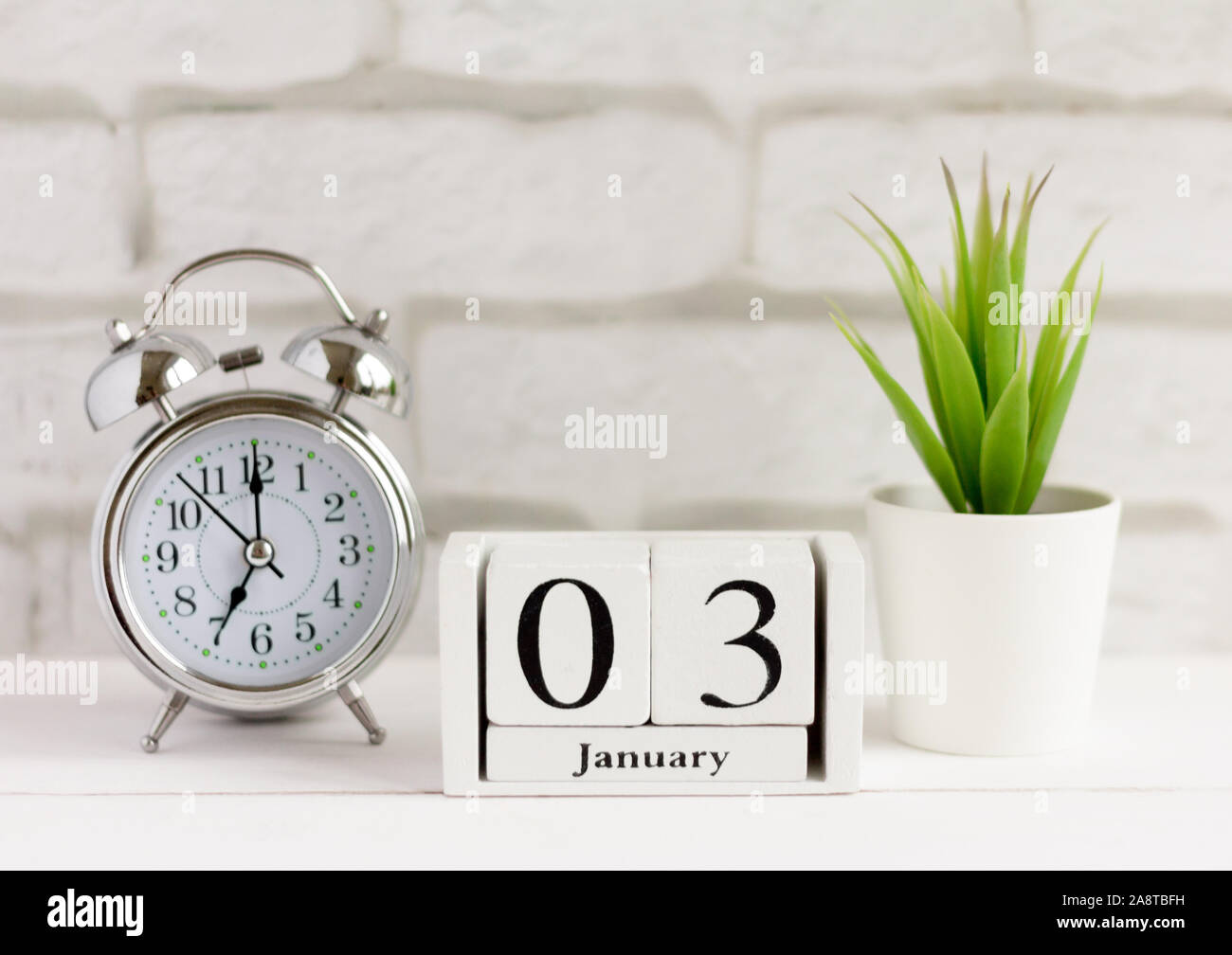 January 3 on the wooden calendar, the beginning of a new day and year Stock Photo