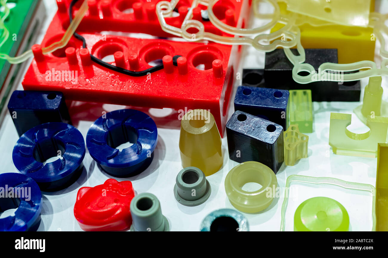 Engineering plastics. Plastic material used in manufacturing industry. Global engineering plastic market concept. Polyurethane and abs plastic parts Stock Photo