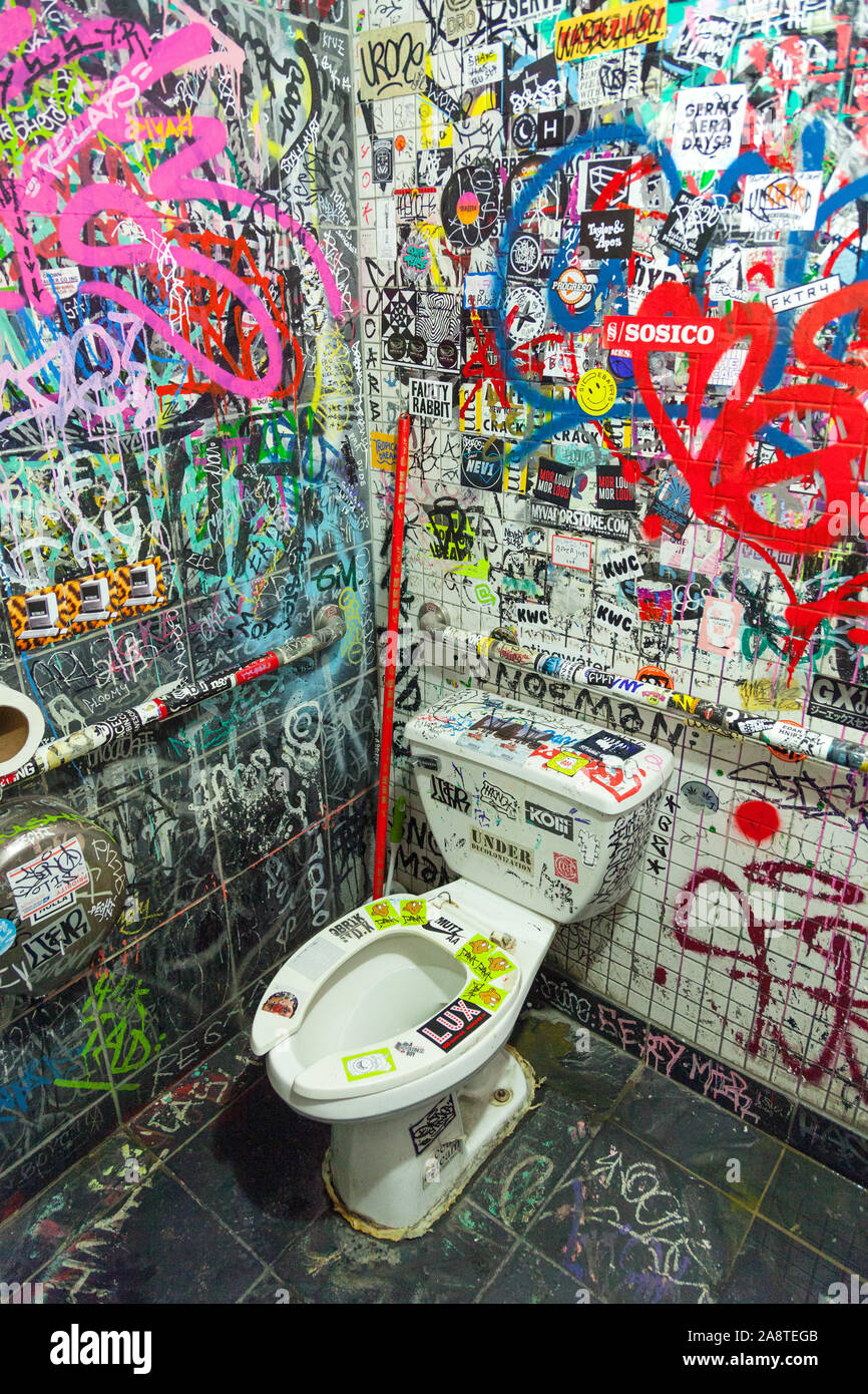 Grafitti covered toilets, Vanessa's Dumplings House 118 Eldridge St, New York City, NY , United states of America. Stock Photo