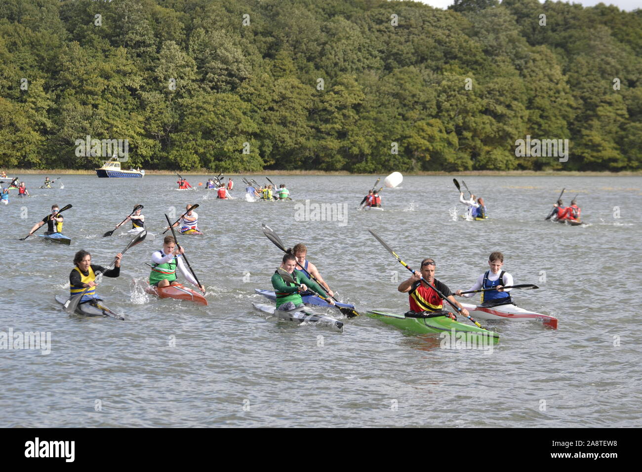 Canoe racing on the River Hamble. View from the jetty in River Hamble Country Park. Hasler Finals 2019 Stock Photo
