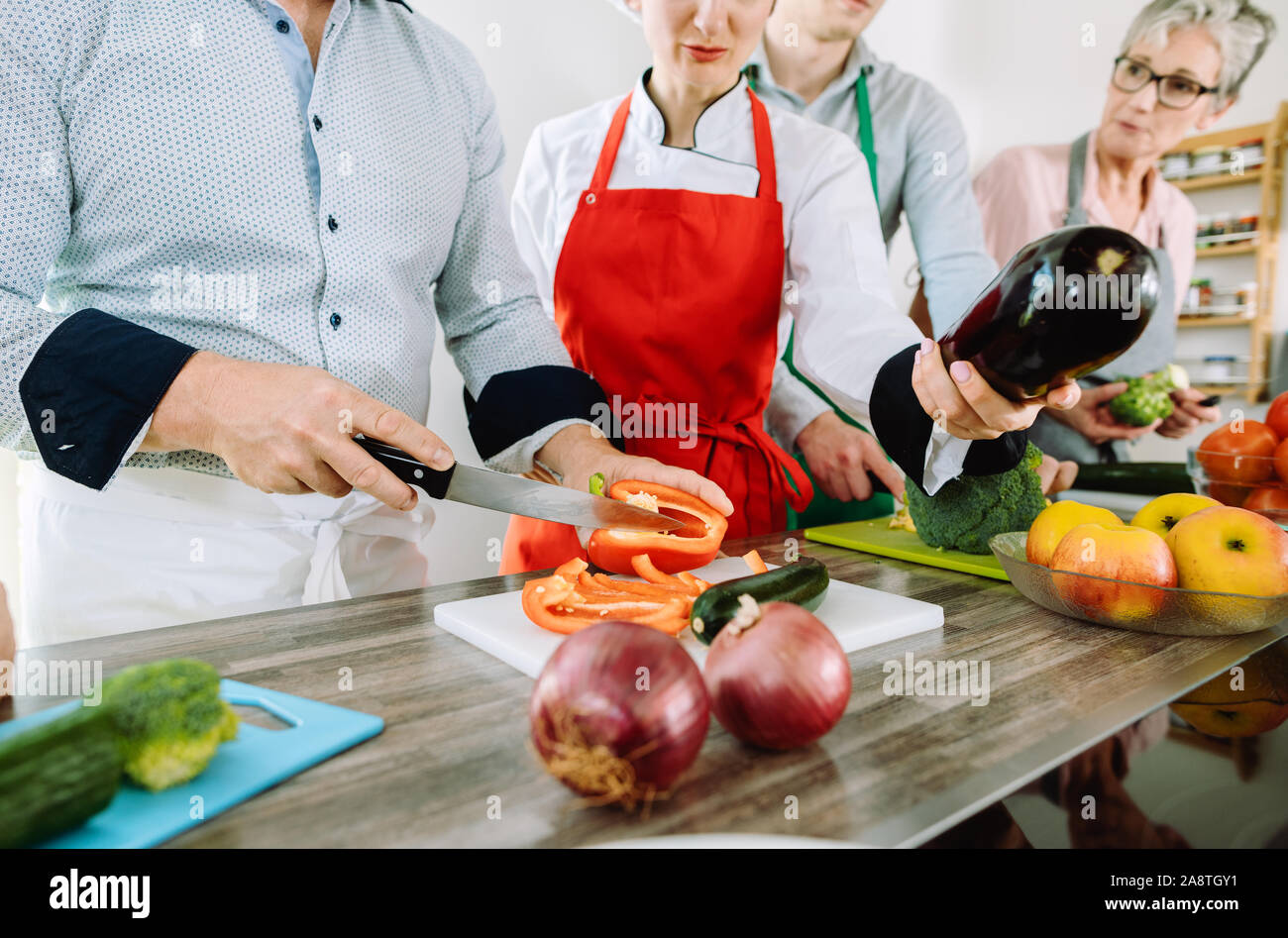 Group of young men in kitchen hi-res stock photography and images - Alamy