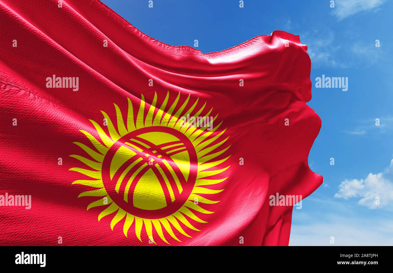 Kyrgyzstan Flag Is Waving Against Blue Sky With Clouds Realistic kyrgyzstan-flag-is-waving-against-blue-sky-with-clouds-realistic