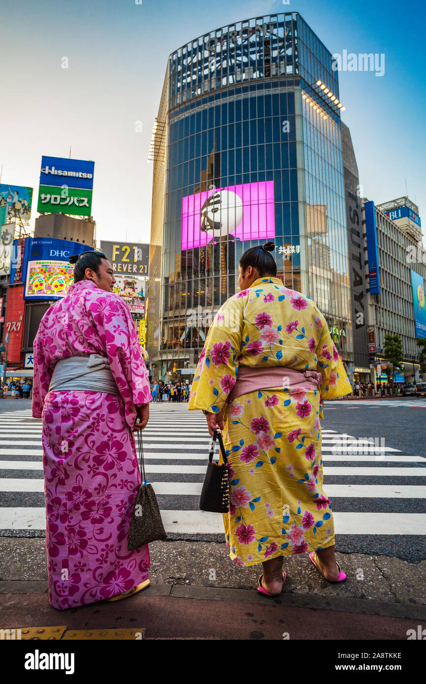 Sumo wrestlers at Shibuya Crossing. Shibuya Crossing, the busiest intersection in the World, Tokyo, Japan, Asia Stock Photo