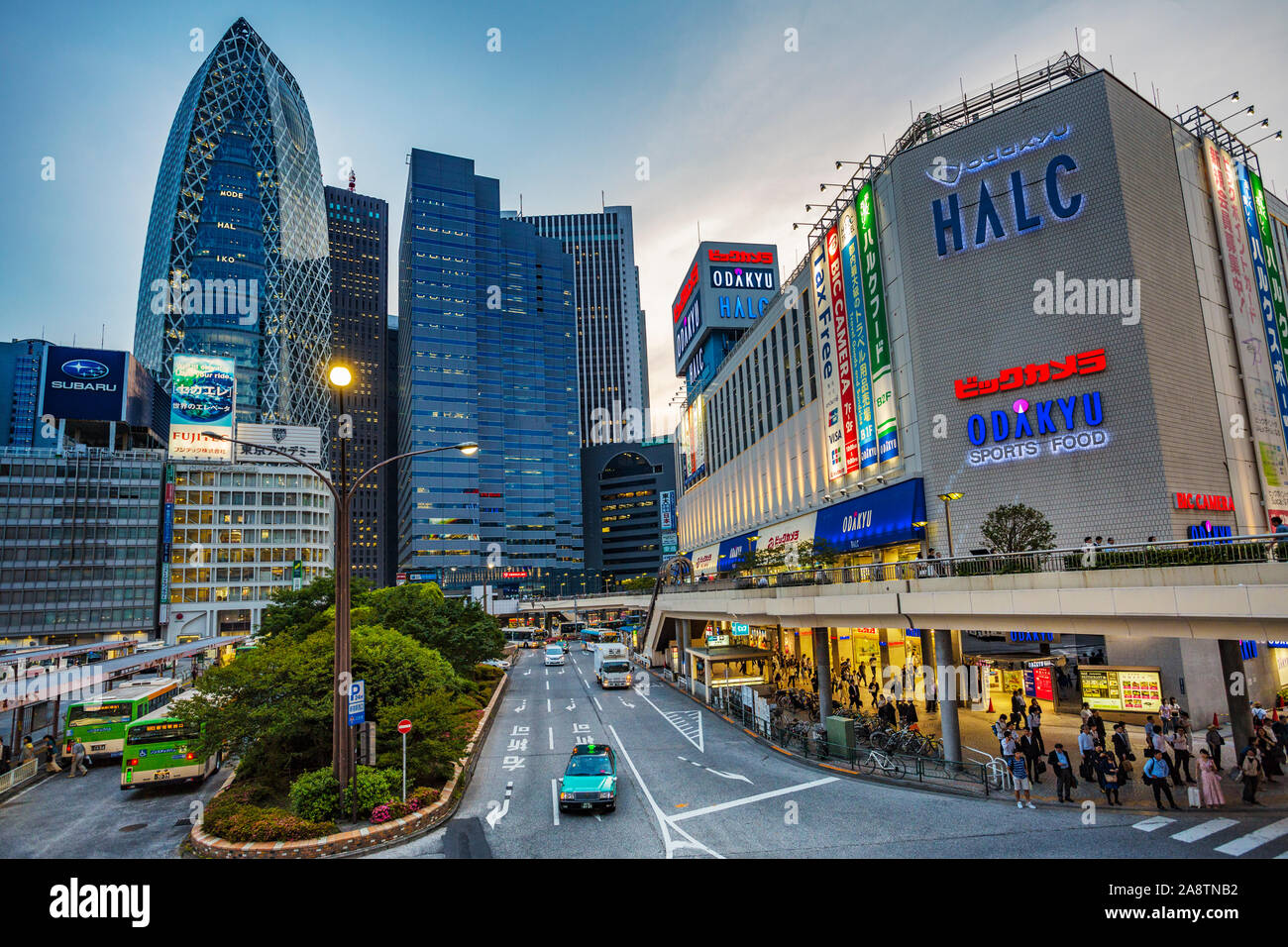 On the left Mode Gakuen Cocoon Tower by Kenzo Tange and Noritaka Tange. Shinjuku district, Tokyo, Japan, Asia Stock Photo