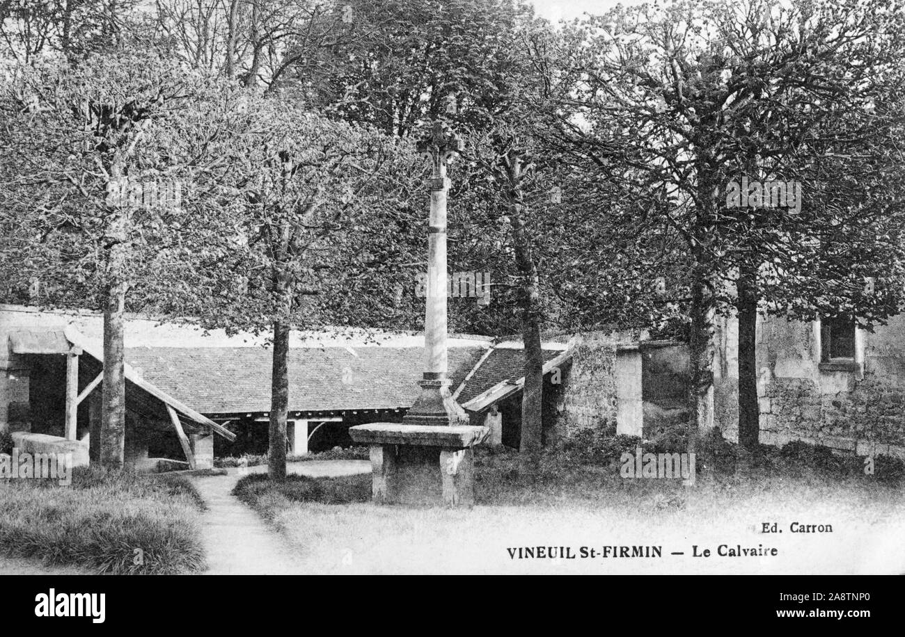 Old postcard image of the calvary (cross) and old wash house at Vineuil-Saint-Firmin, Oise, France Stock Photo