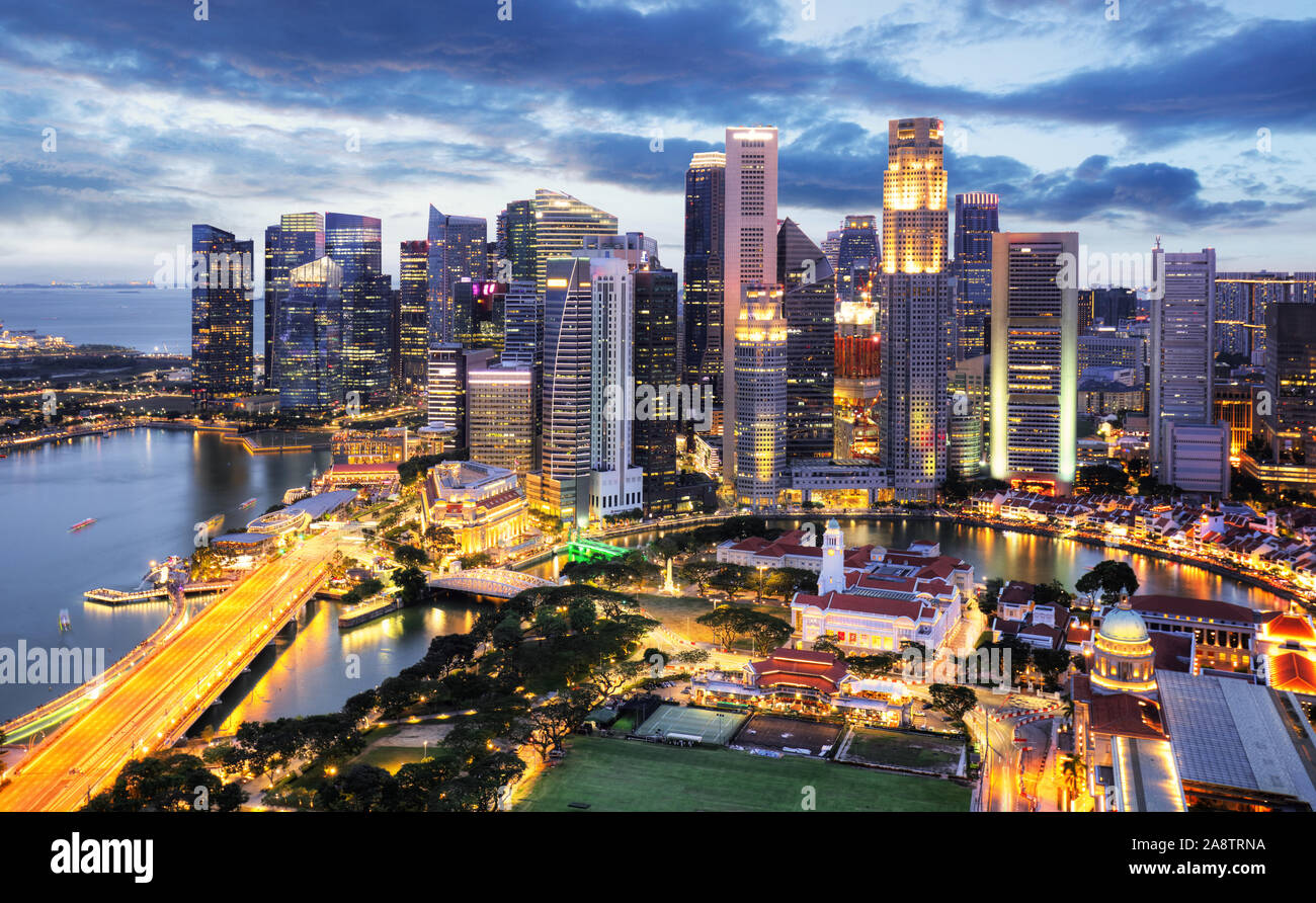 Panoramic image of Singapore skyline at night. Stock Photo