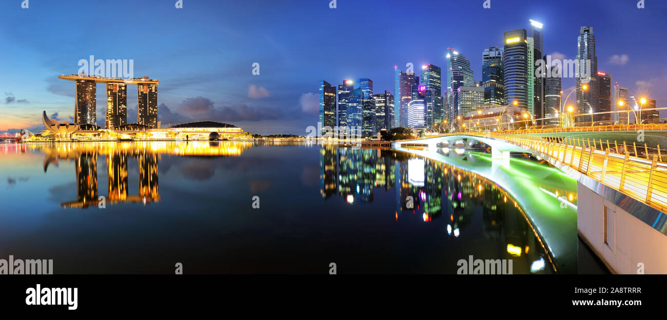 Singapore Marina bay at night with bridge Stock Photo