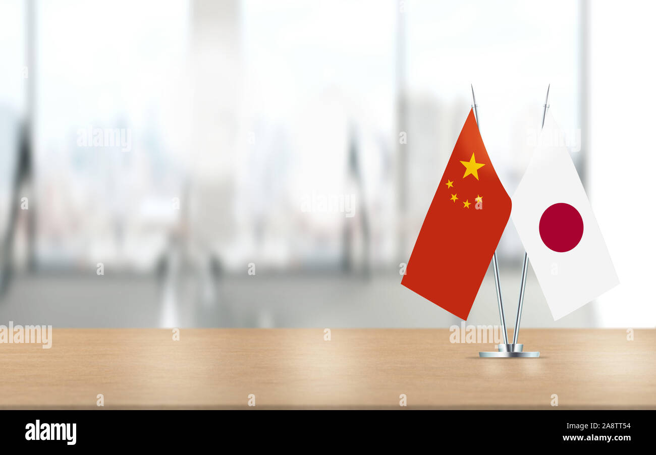 Chinese And Japanese Flags Are Paired Together. Realistic 3d Lighting 