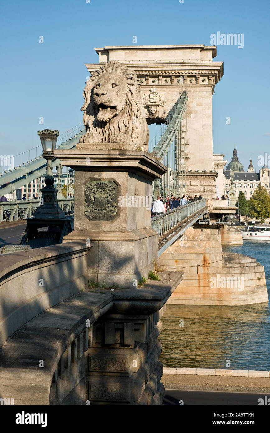 Lion statue on plinth of Budapest Chain Bridge Stock Photo
