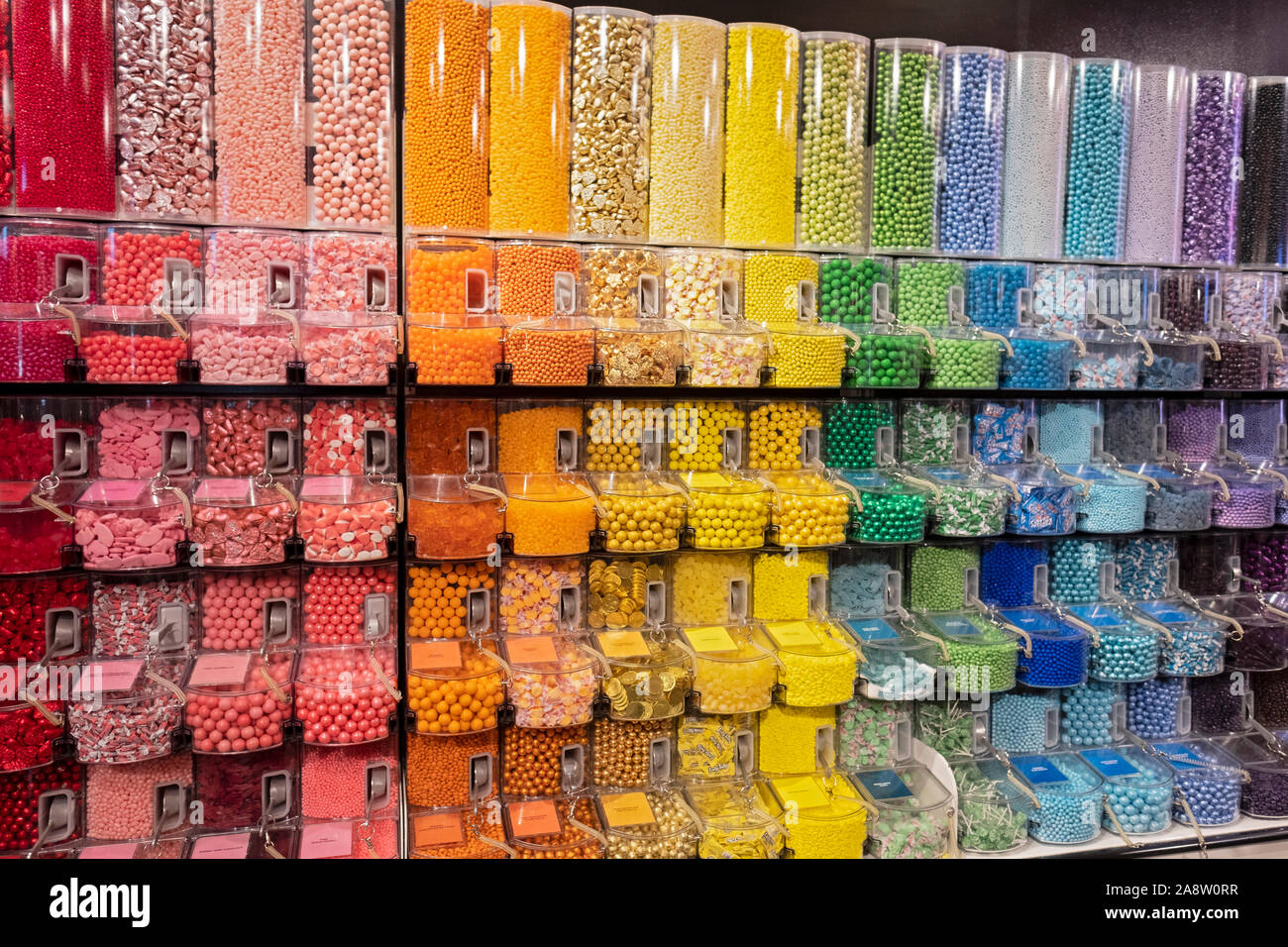 A colorful display of candy dispensers at Dylan's Candy Bar, a boutique candy shop on Union Square West in downtown Manhattan, New York City. Stock Photo
