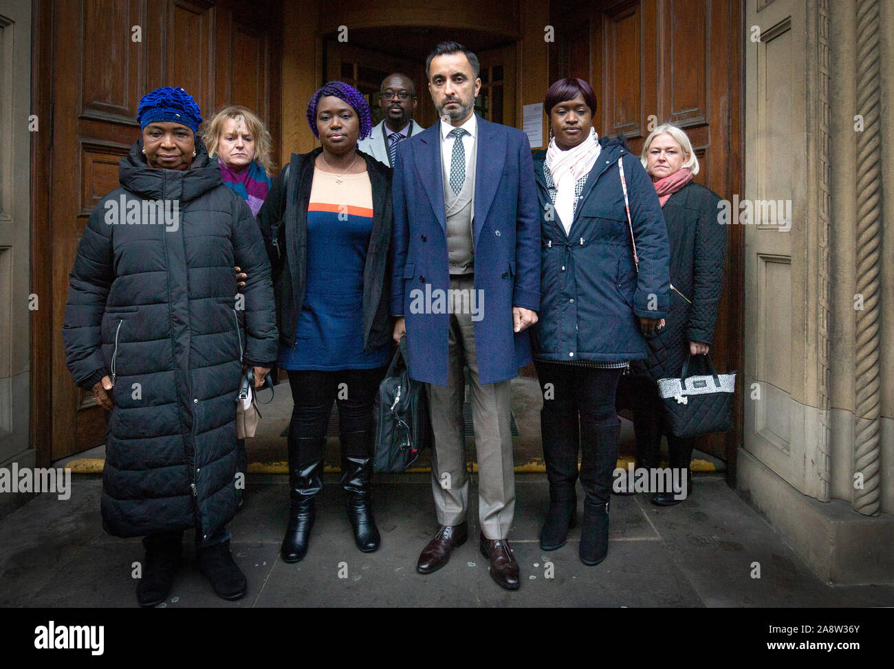 Solicitor Aamer Anwar (centre) arrives at the Crown Office in Edinburgh, with family members of the late Sheku Bayoh, including his mother Aminata (left), who died in police custody in 2015. At a meeting, the family of Mr Bayoh, along with their solicitor Aamer Anwar, will speak with the Lord Advocate, Solicitor General for Scotland Alison Di Rollo QC, Crown Counsel Alex Prentice QC, and Deputy Crown Agent Lindsey Miller. Stock Photo
