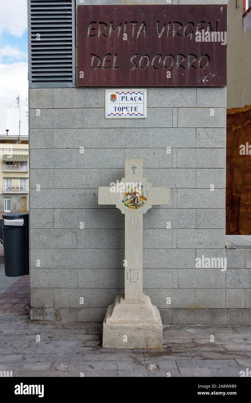 A cross marking the route of the Alicnte to Santa Faz Pilgrimage undertaken during Easter week or Seman Santa in calle Virgen de Soccoro Alicante Stock Photo