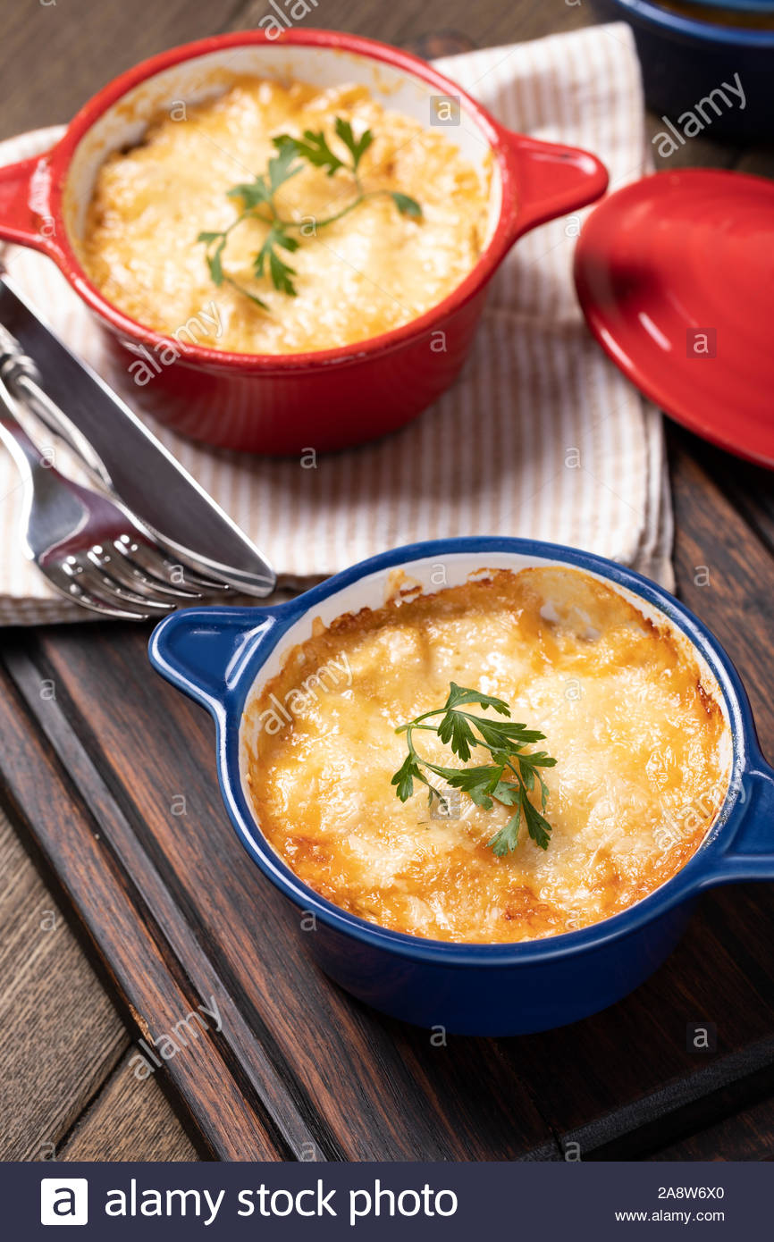 Baked Mushroom Julienne With Chicken And Cheese In Pots Stock Photo Alamy