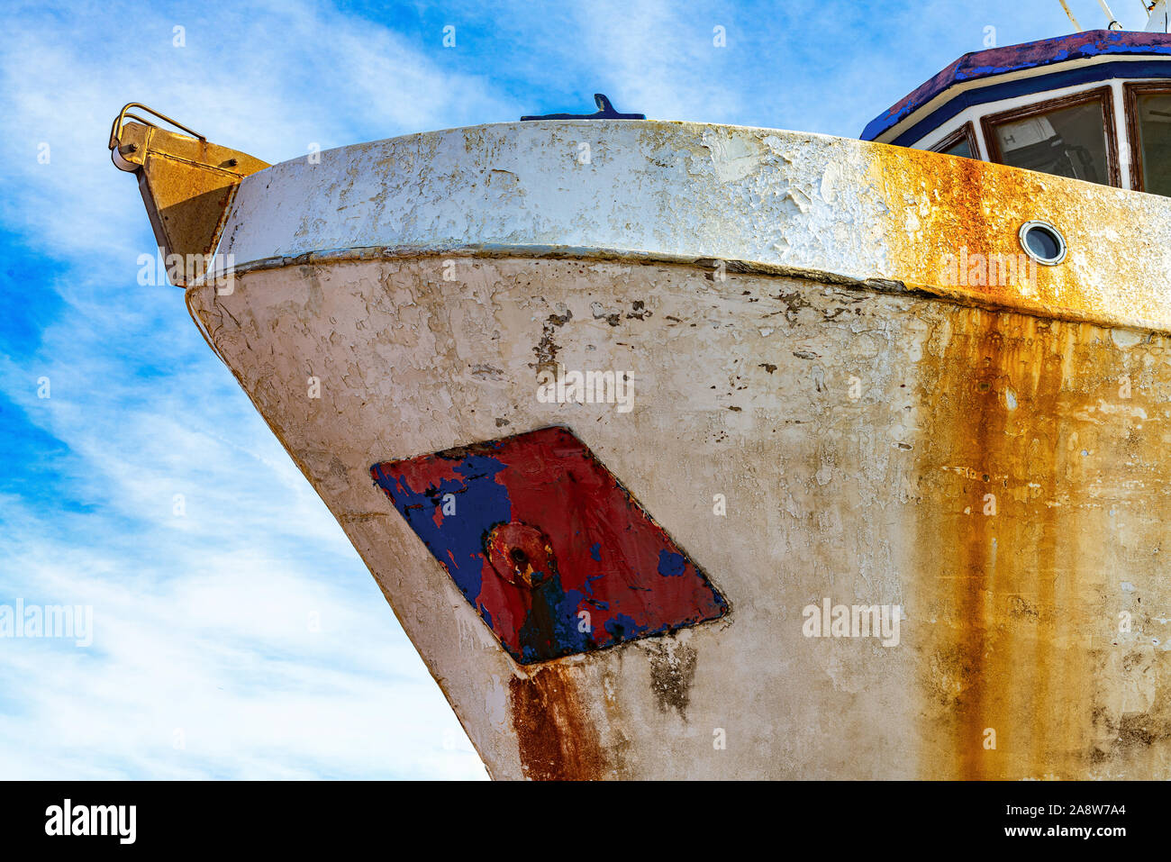 prow of old rusty ship on a slipway on the shore Stock Photo