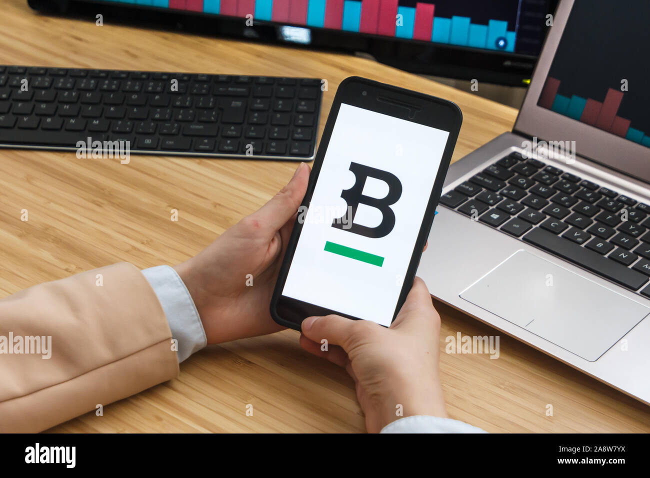 Bitstamp Cryptocurrency Exchange Market. Female Trader Hands Holding the  Smartphone Using Application. Crypto Background Concept, San Francisco  Stock Photo - Alamy