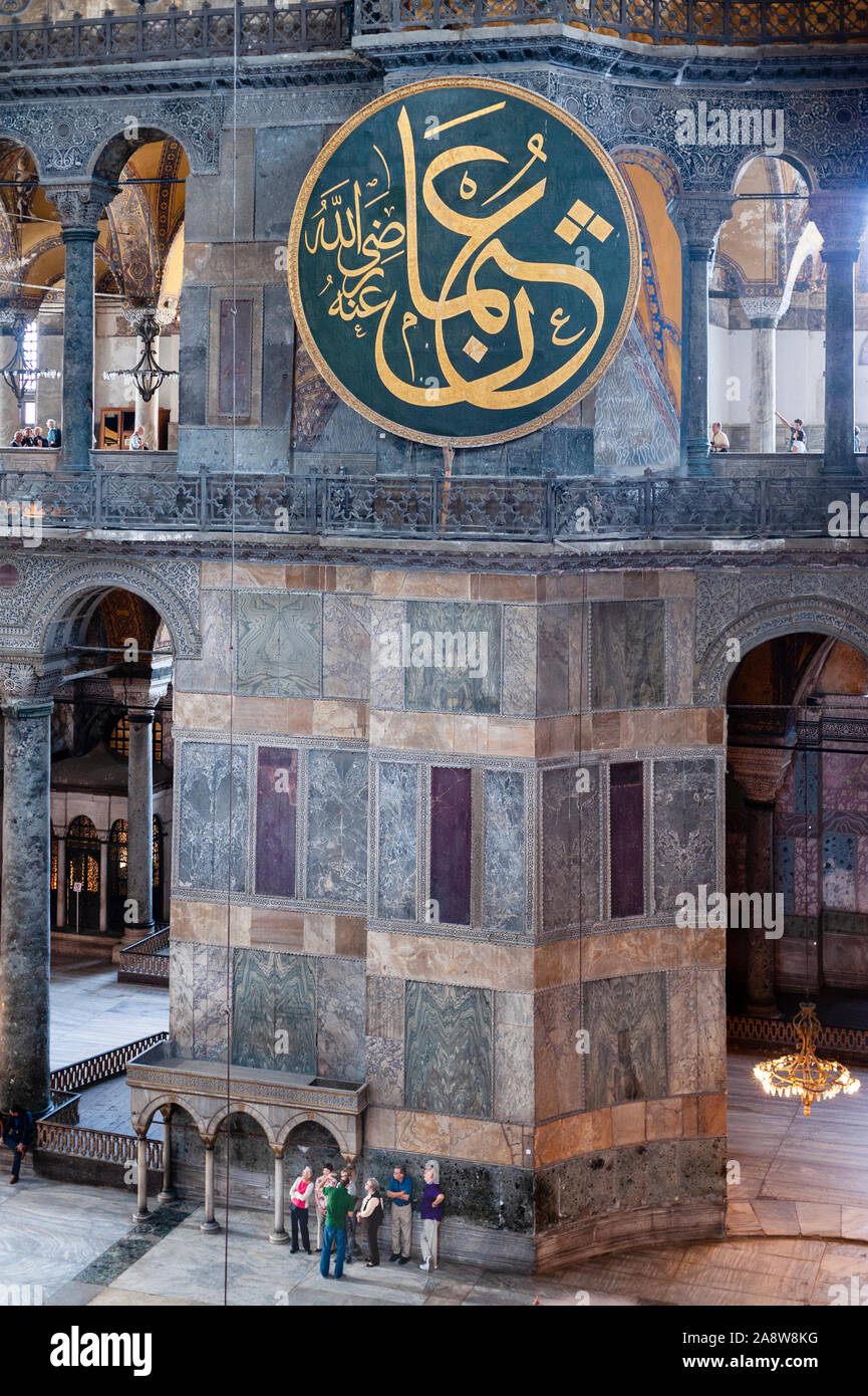 Byzantine Architecture interior of Hagia Sophia Aya Sophia in Sultanahmet Istanbul with medallion bearing Arabic calligraphy from Ottoman empire Stock Photo