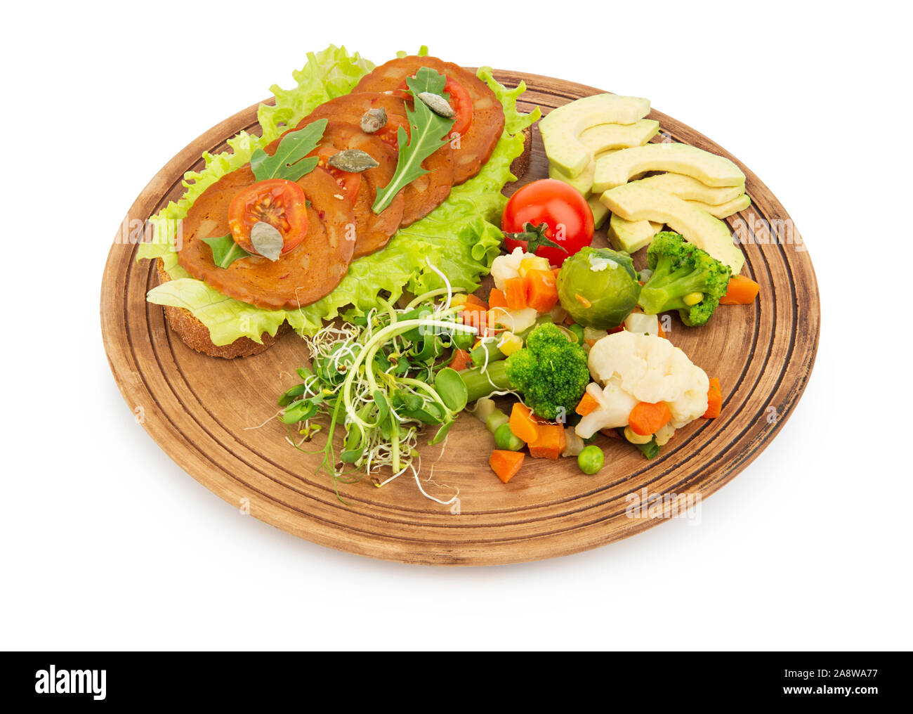 Seitan sandwich and vegetables, healthy vegan meals on a plate, isolated on white background