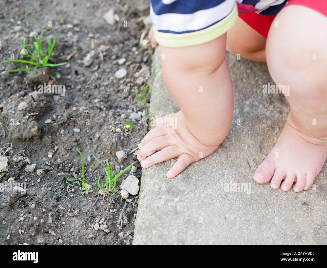 Child learns to walk hi-res stock photography and images - Alamy