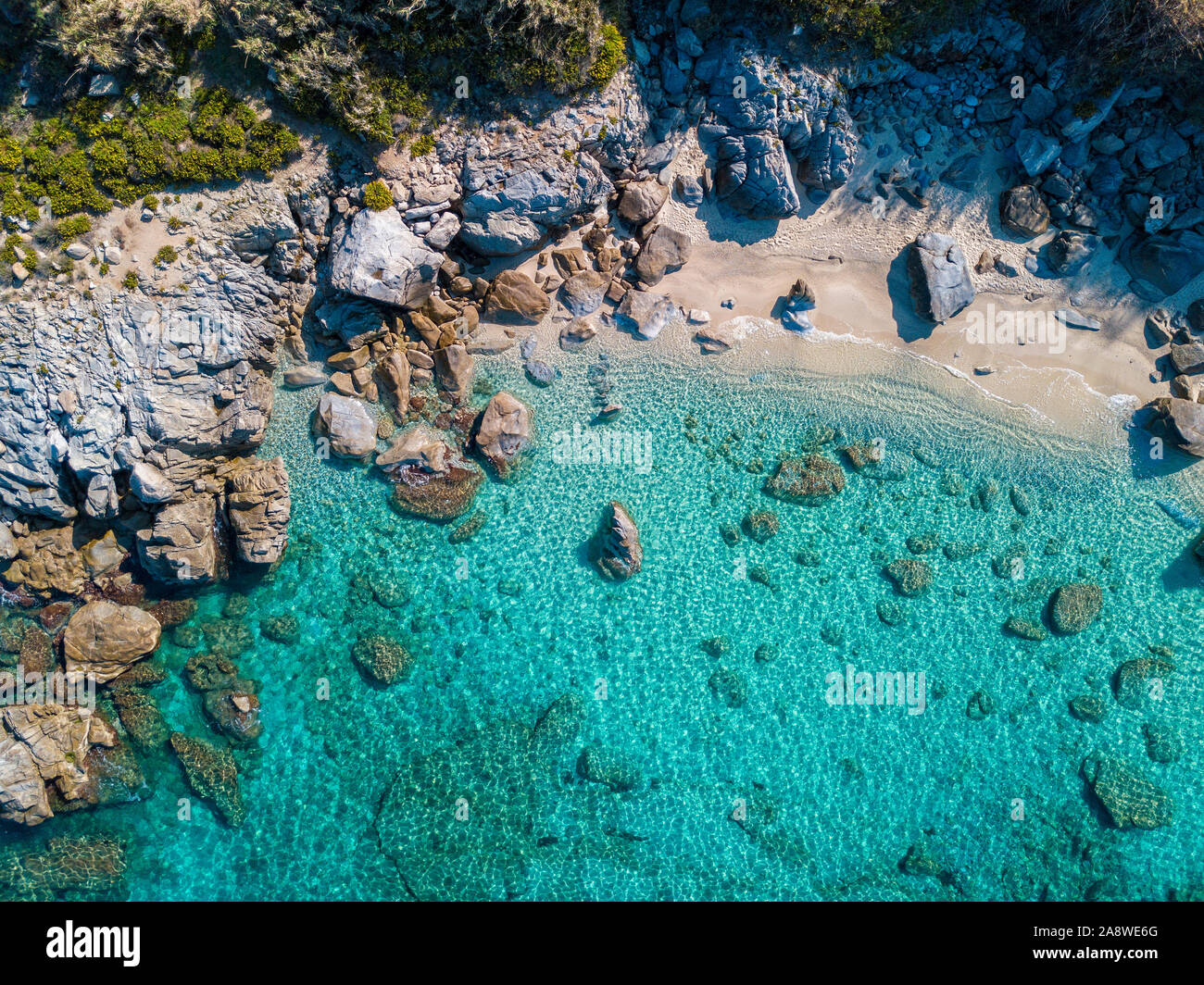 Aerial view of Tropea beach, crystal clear water and rocks that appear ...