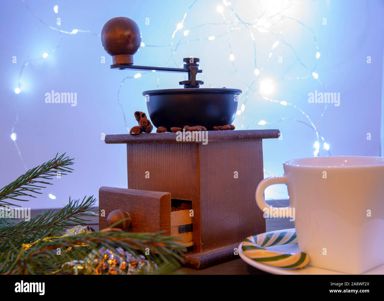 Manual coffee grinder on a new year background Stock Photo